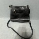 Black Quilted Faux Leather Crossbody Bag with Tassel and Zipper Pockets